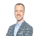 Why is implementation more important than the features a software may offer?